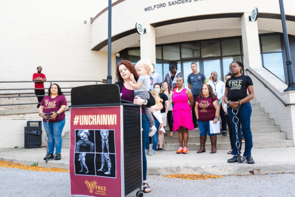 Photograph of ACLU of Wisconsin Coalition & Relations Advocate Melissa Ludin speaking against shackling at a press conference