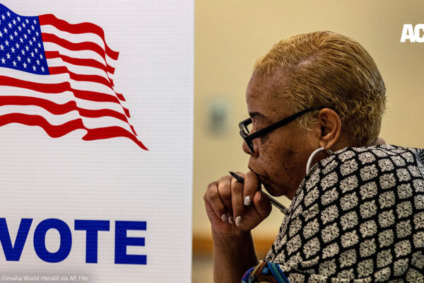 Voter at ballot box