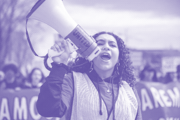 Activist leading chants using a megaphone