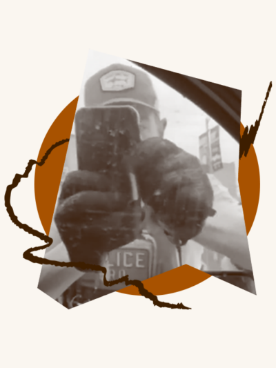 ICE agent filming someone in their car using his phone