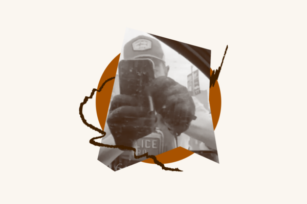 ICE agent filming someone in their car using his phone