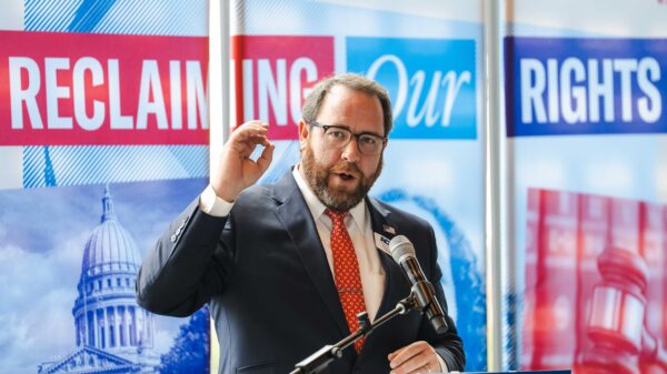 Legal Director Ryan Cox speaking at Reclaiming Our Rights Luncheon 2026