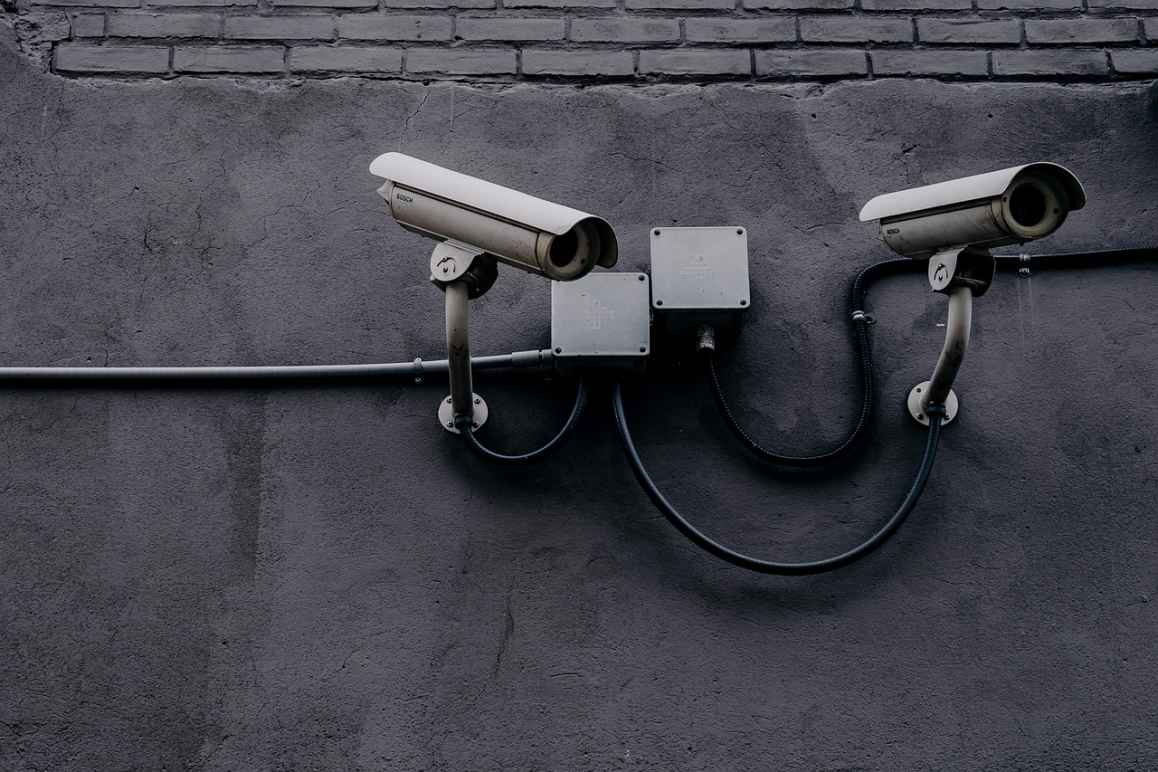 Photo of two security cameras.