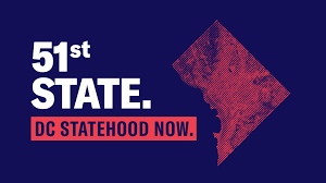 In white font, the text reads "51st State" in center of graphic against a dark blue background. Below "State," in navy, overlaying a red bar, the text reads: DC STATEHOOD NOW." 