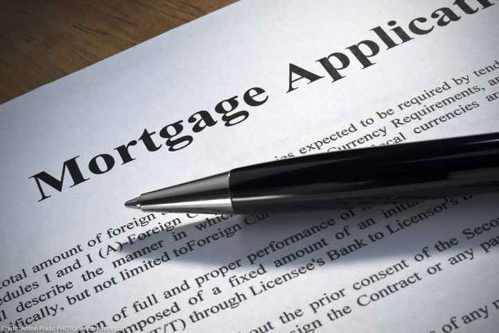 Close up of a mortgage application and a pen.